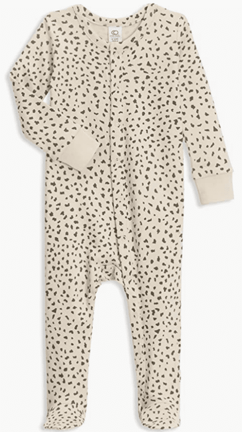 Organic Cotton baby pajamas by colored organics. Button down front, footies, with black and white cow pattern print. 
